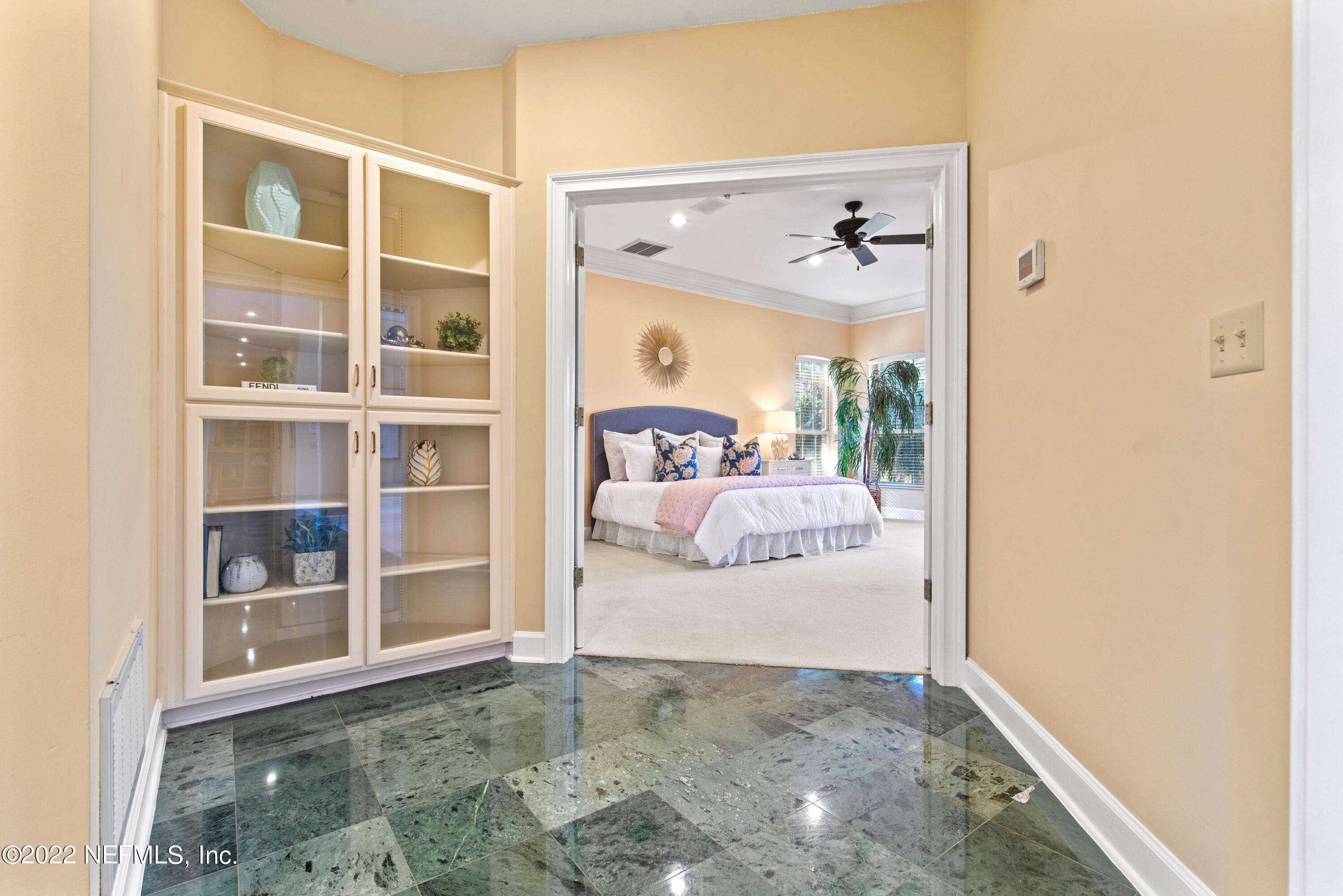 12608 Mandarin Road Jacksonville, FL 32223 - Photo 12 of 55 a view of a bedroom from a hallway