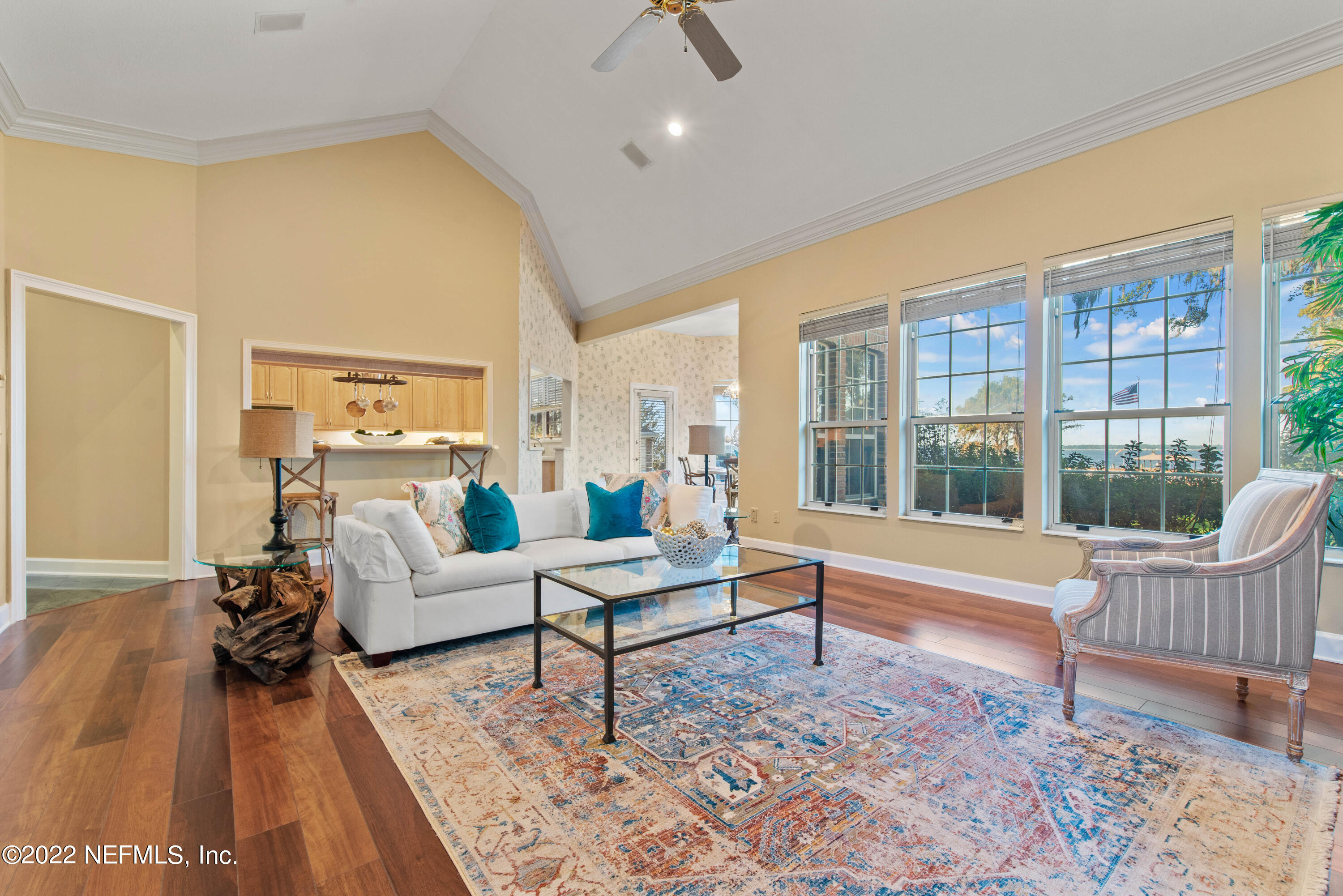 12608 Mandarin Road Jacksonville, FL 32223 - Photo 19 of 55 a living room with furniture and a large window