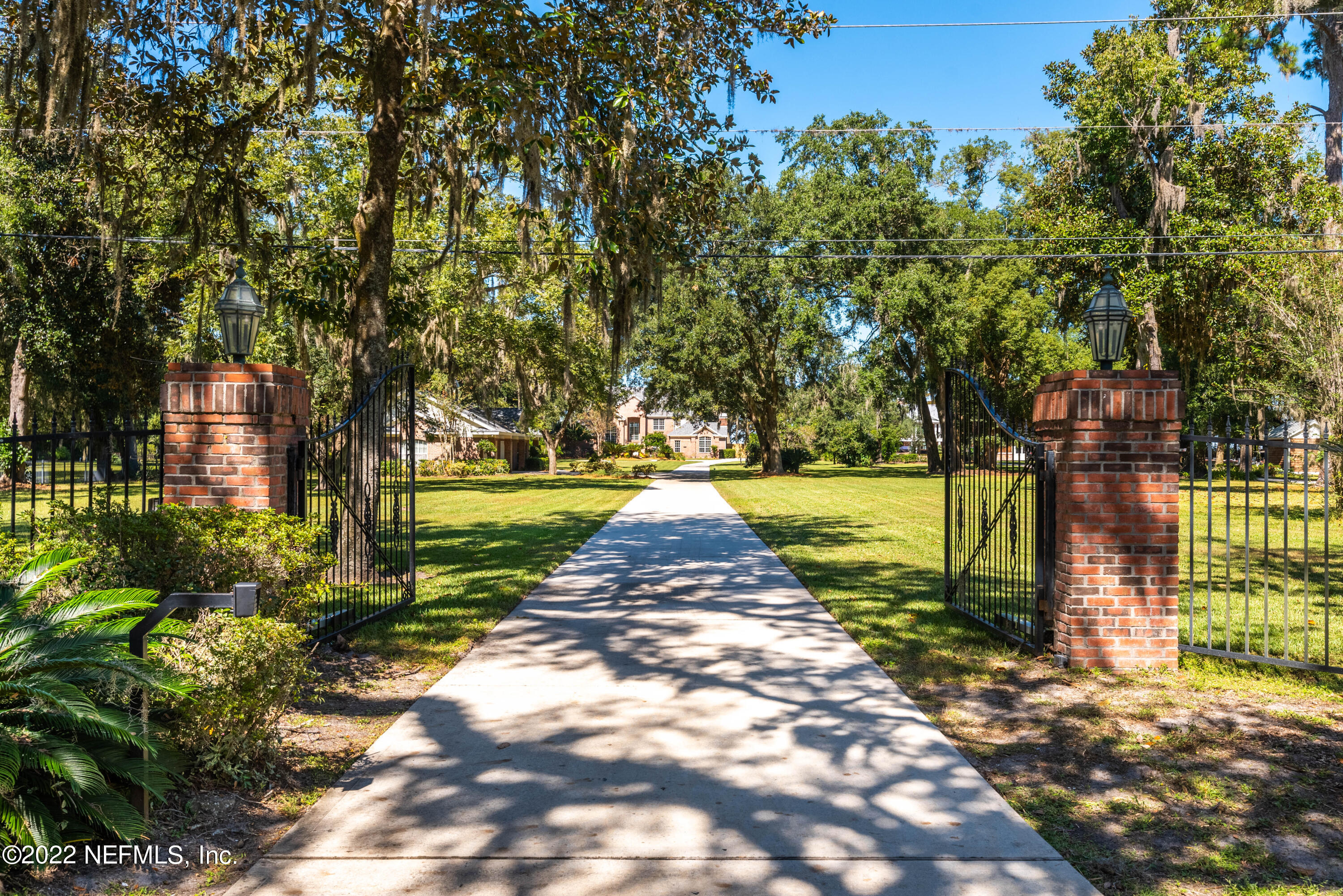 12608 Mandarin Road Jacksonville, FL 32223 - Photo 2 of 55 a view of yard with swimming pool and green space