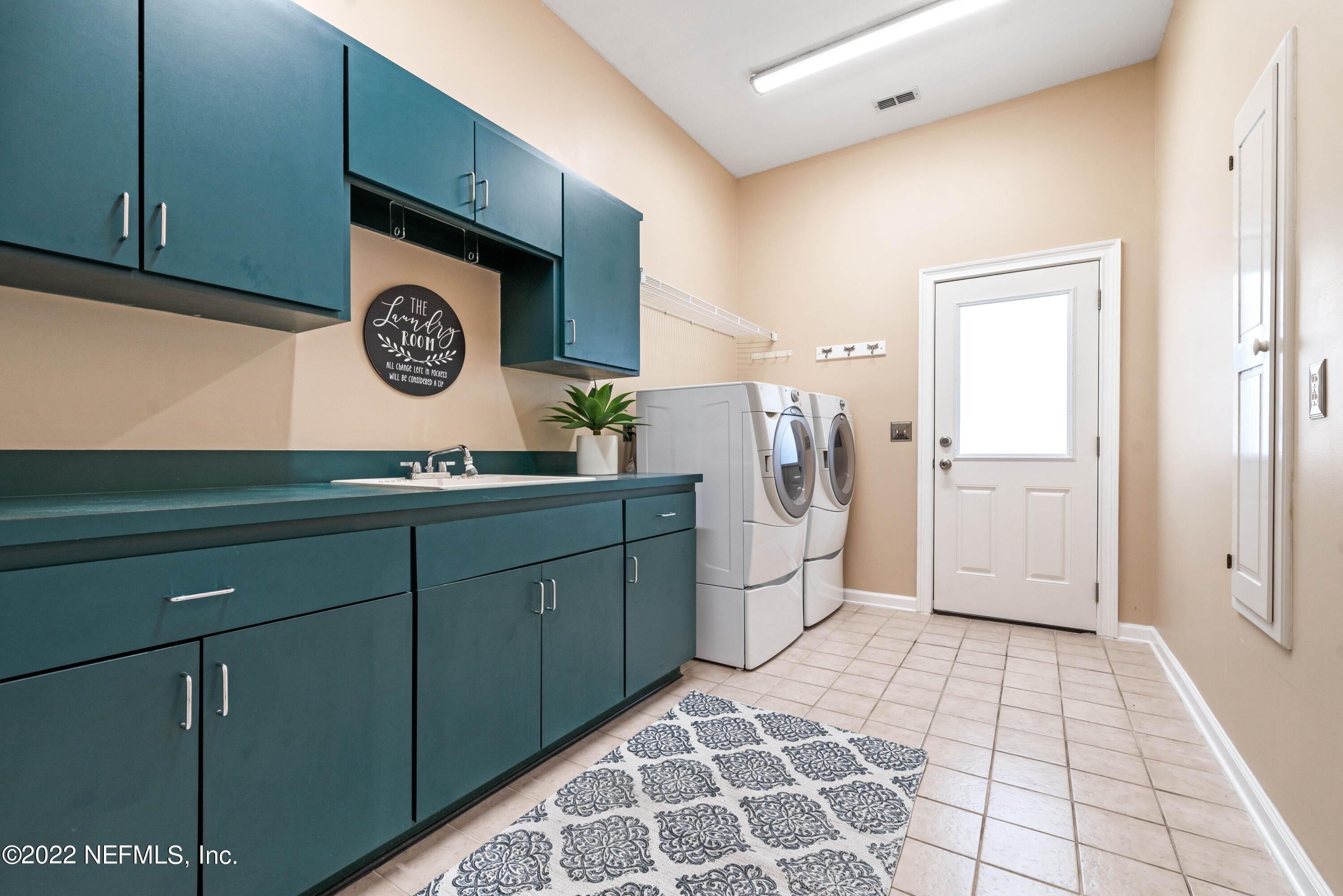 12608 Mandarin Road Jacksonville, FL 32223 - Photo 26 of 55 a view of a storage & utility room with a sink