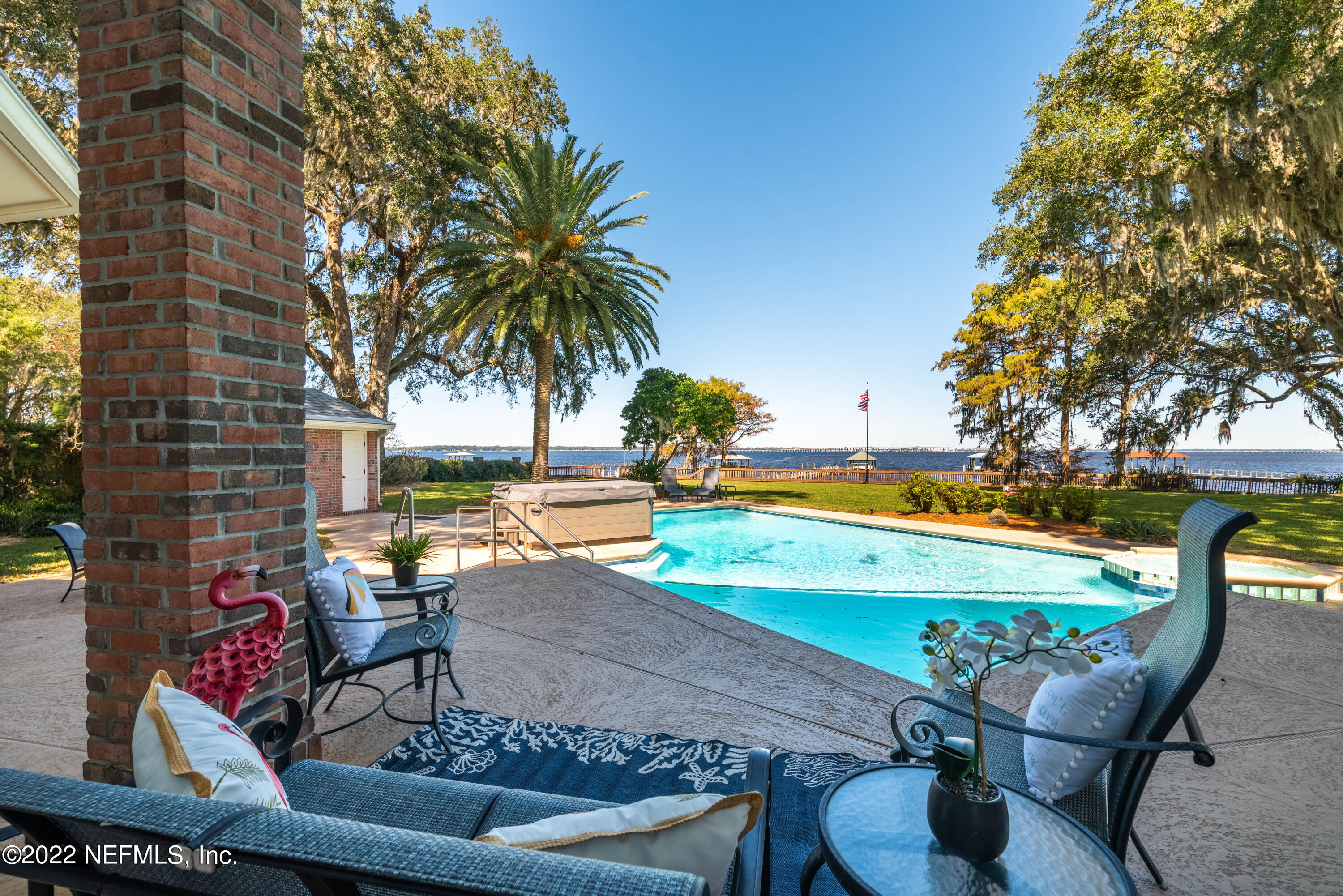12608 Mandarin Road Jacksonville, FL 32223 - Photo 37 of 55 a view of a swimming pool with lounge chairs