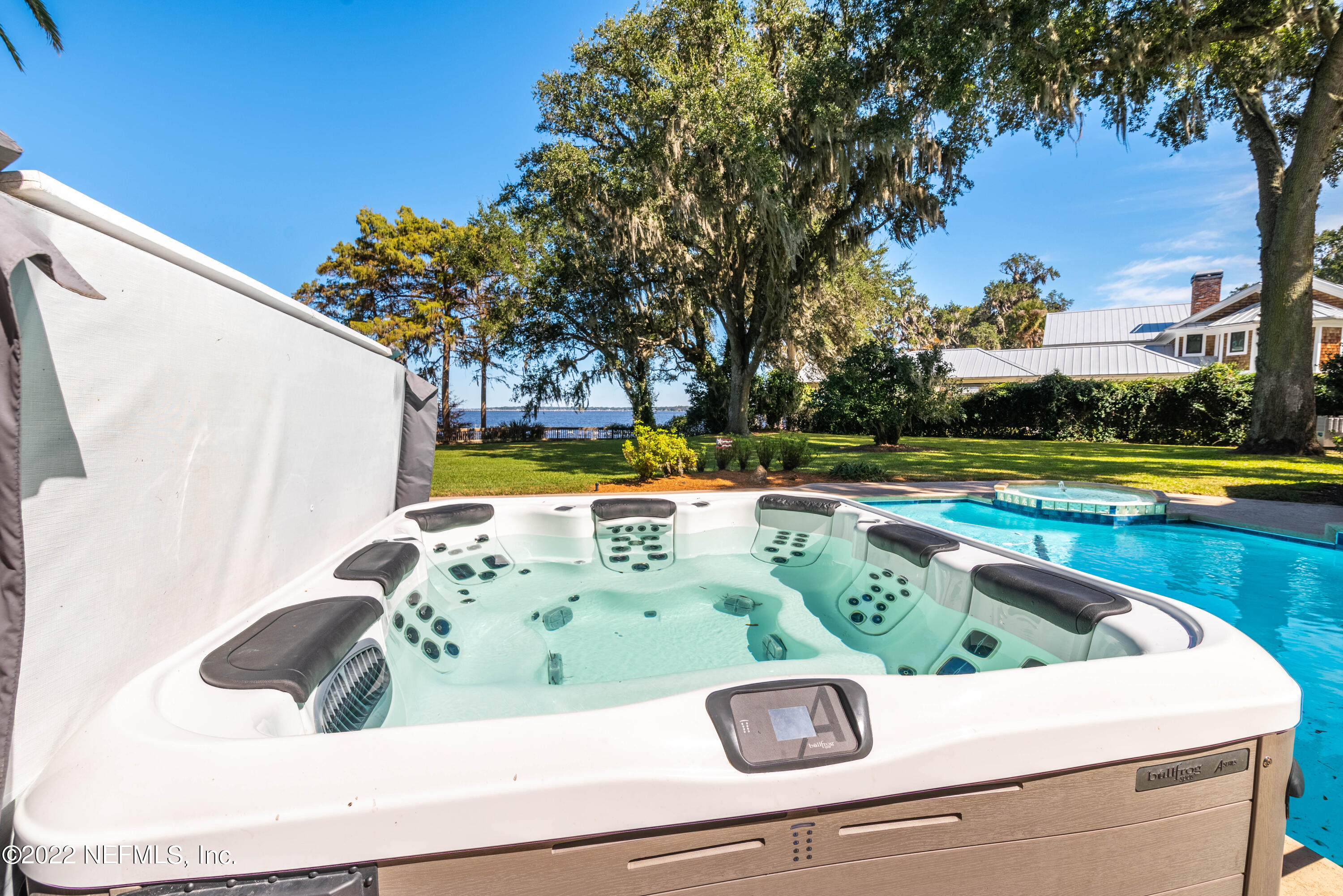12608 Mandarin Road Jacksonville, FL 32223 - Photo 42 of 55 a view of swimming pool with outdoor seating and yard