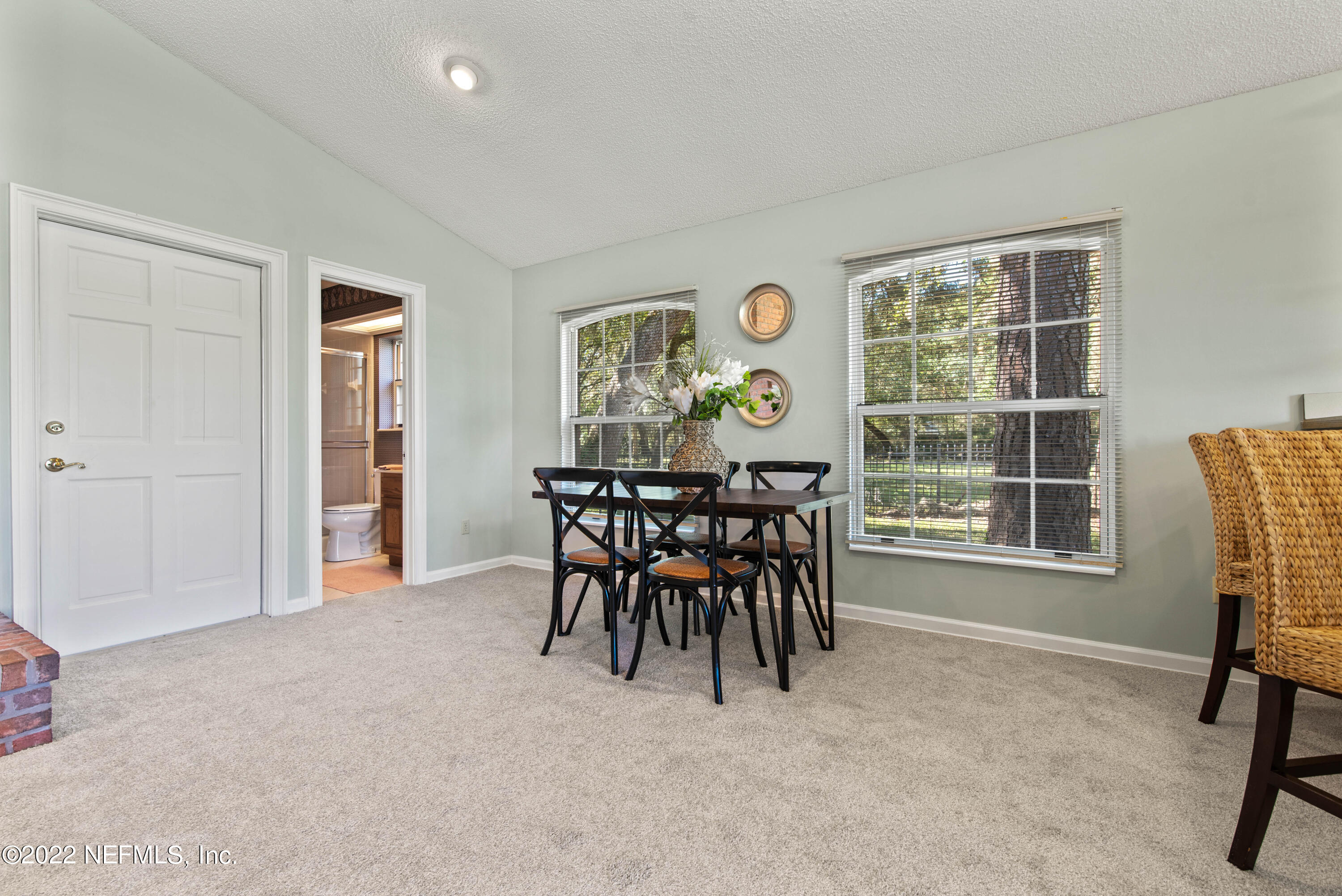 12608 Mandarin Road Jacksonville, FL 32223 - Photo 47 of 55 a dining room with furniture and window