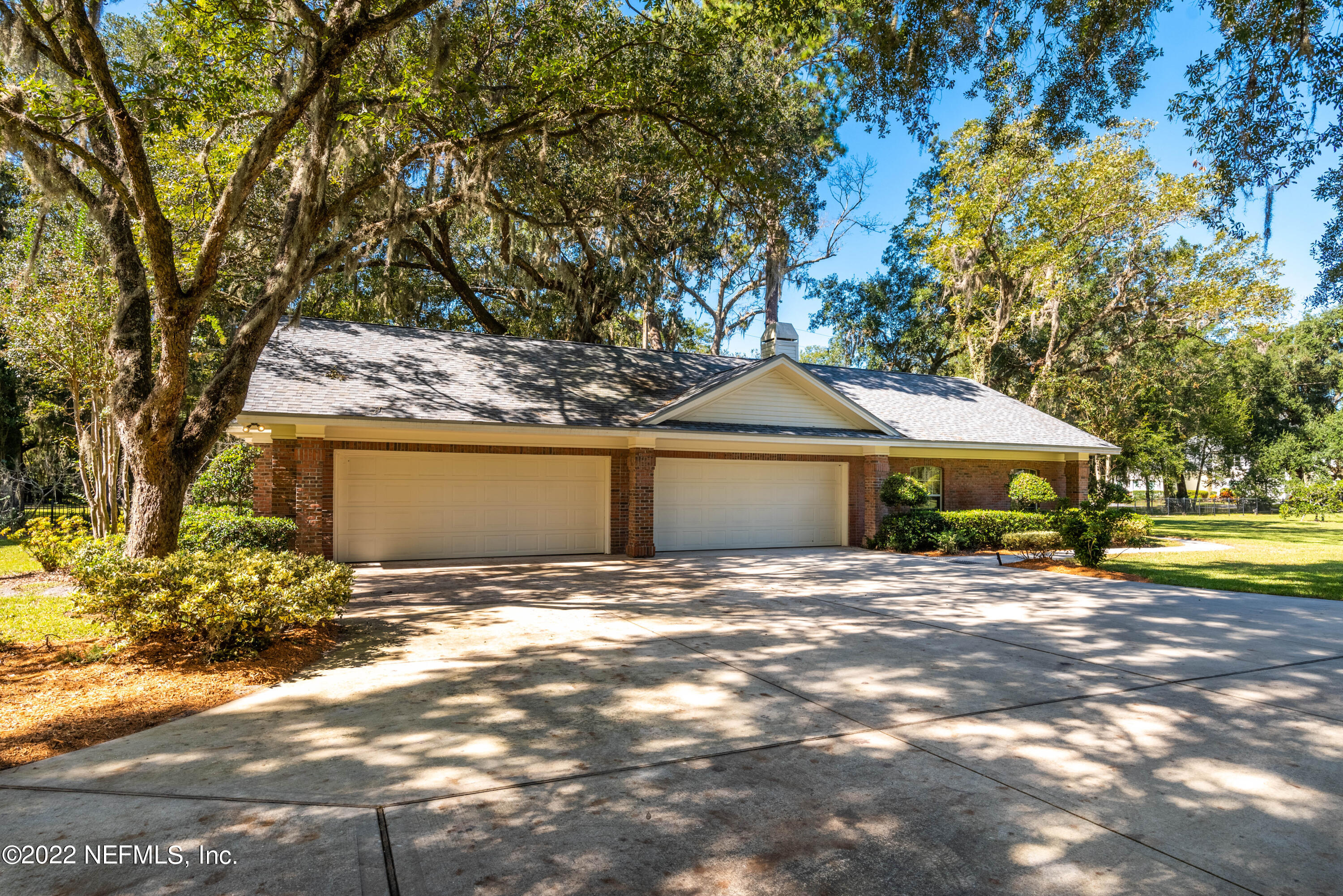12608 Mandarin Road Jacksonville, FL 32223 - Photo 50 of 55 a view of a house with a yard