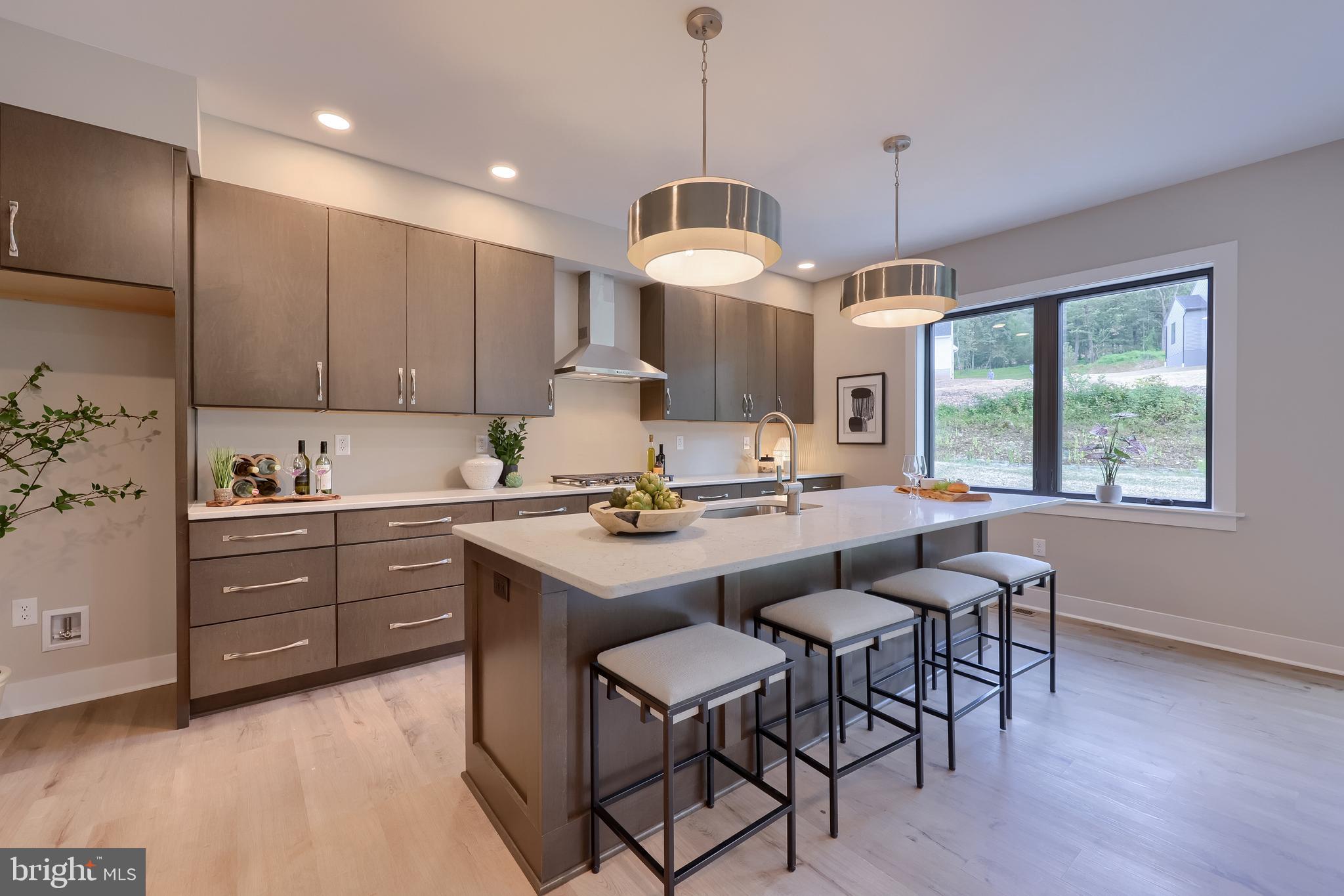 192 Morleton Avenue Marysville, PA 17053 - Photo 12 of 39 a kitchen with a dining table chairs sink and cabinets