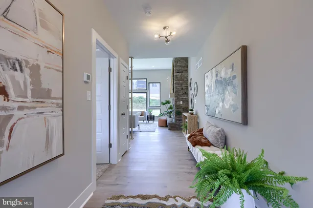 a view of a hallway with workspace