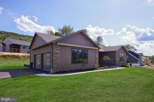 a view of a house with a garden