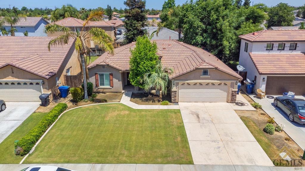 Undisclosed Address Bakersfield, CA 93312 - Photo 22 of 28 a view of a house with swimming pool