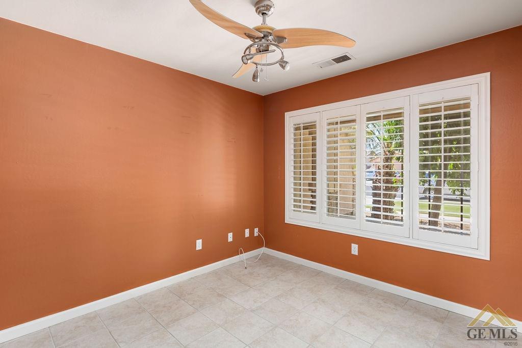 Undisclosed Address Bakersfield, CA 93312 - Photo 10 of 28 a view of an empty room with a window