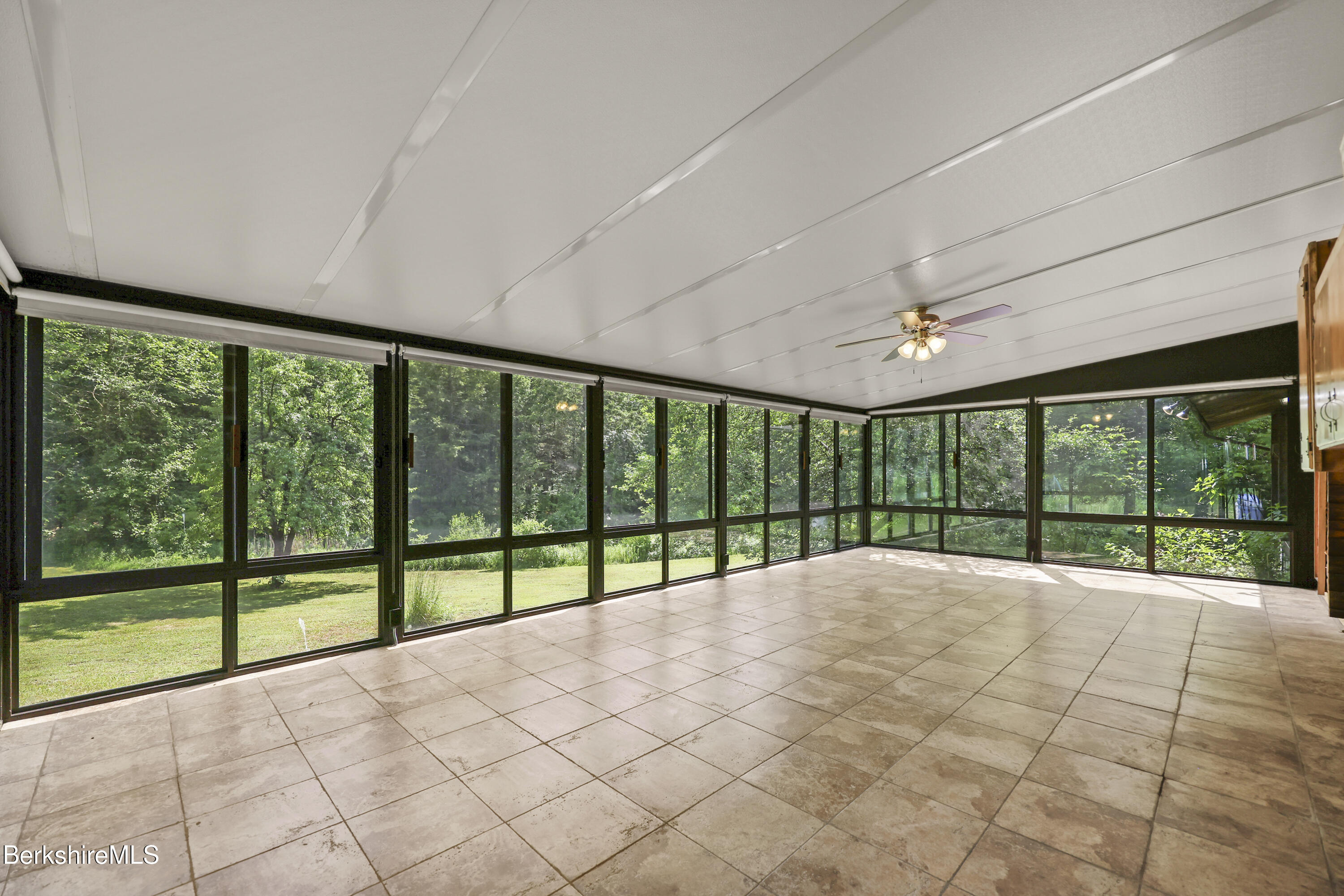 240 Kirchner Road Dalton, MA 01226 - Photo 26 of 51 a view of an empty room with a large window