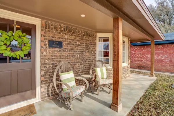 a building outdoor space with patio furniture