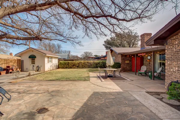 a view of a outdoor space with a patio