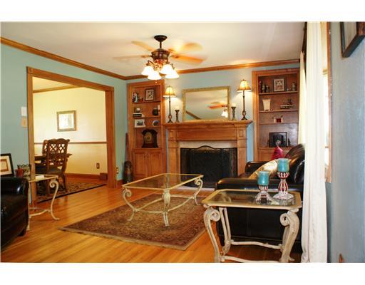 218 Brookwood Road Venetia, PA 15367 - Photo 3 of 18 Living Room. Charming built in book cases flank the log burning fireplace....all the natural wood finishes gives the room a cozy, comfortable feeling.