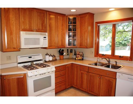 218 Brookwood Road Venetia, PA 15367 - Photo 6 of 18 Kitchen. Beautiful cabinetry with solid surface counter tops. Lots of recessed lighting as well. Notice the extra tall cabinets with crown molding.
