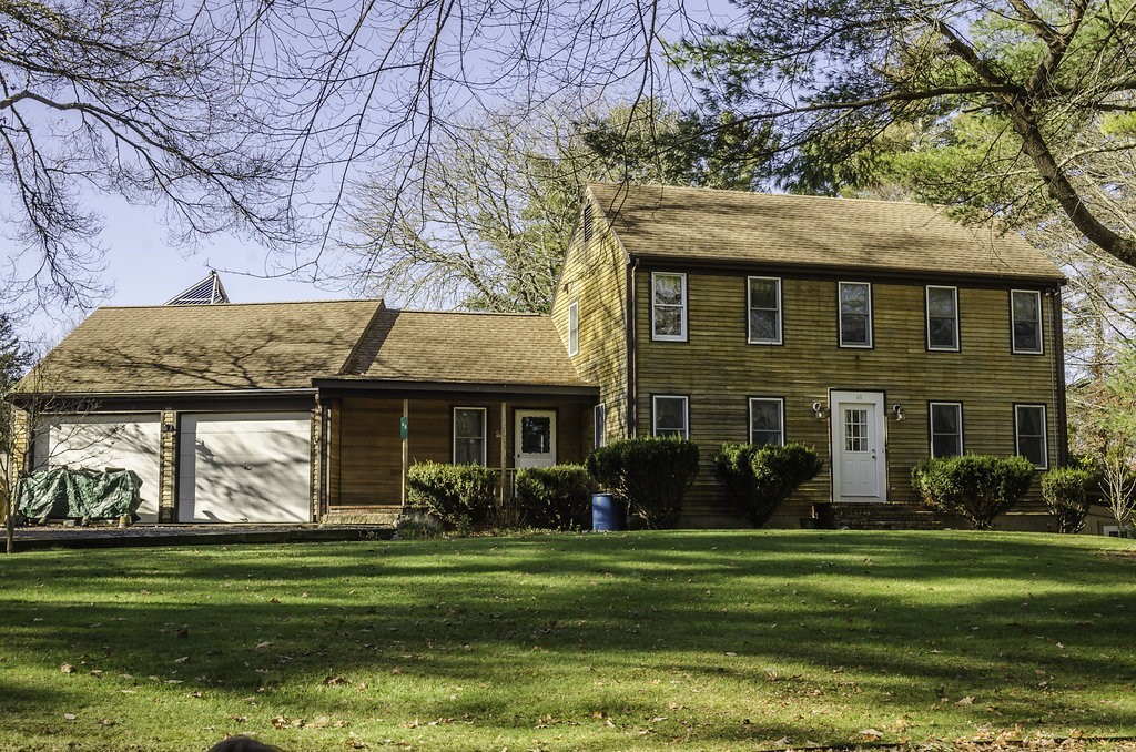 45 Sarah Sherman Road Rochester, MA 02770 - Photo 1 of 25 a front view of a house with a garden