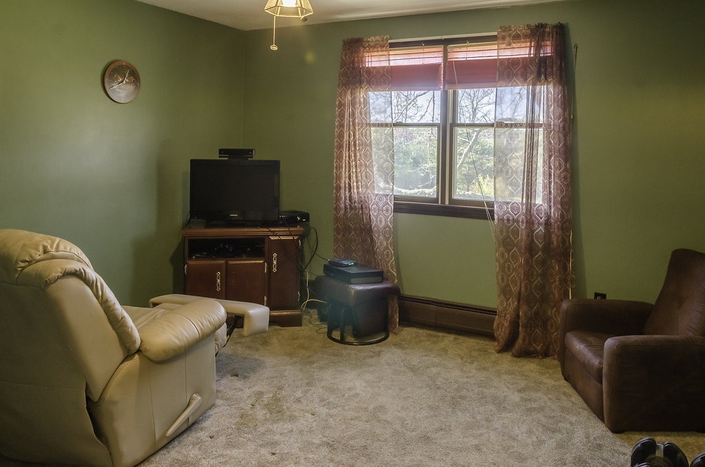 45 Sarah Sherman Road Rochester, MA 02770 - Photo 14 of 25 a living room with furniture and a window