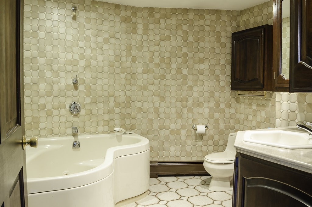 45 Sarah Sherman Road Rochester, MA 02770 - Photo 16 of 25 a bathroom with a sink a toilet and a mirror
