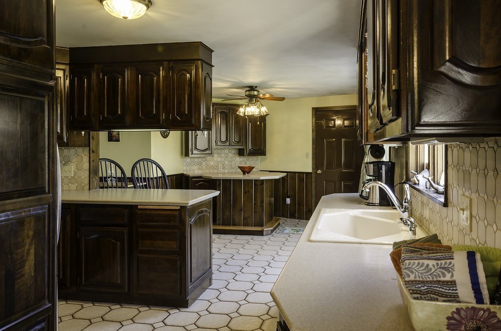 45 Sarah Sherman Road Rochester, MA 02770 - Photo 4 of 25 a kitchen with stainless steel appliances granite countertop a sink stove and cabinets