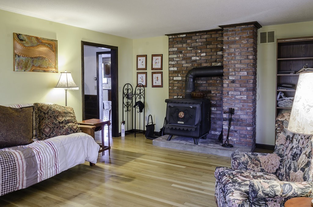 45 Sarah Sherman Road Rochester, MA 02770 - Photo 7 of 25 a living room with furniture and a fireplace