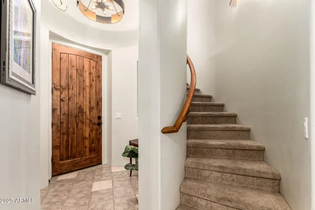 a view of entryway with a front door