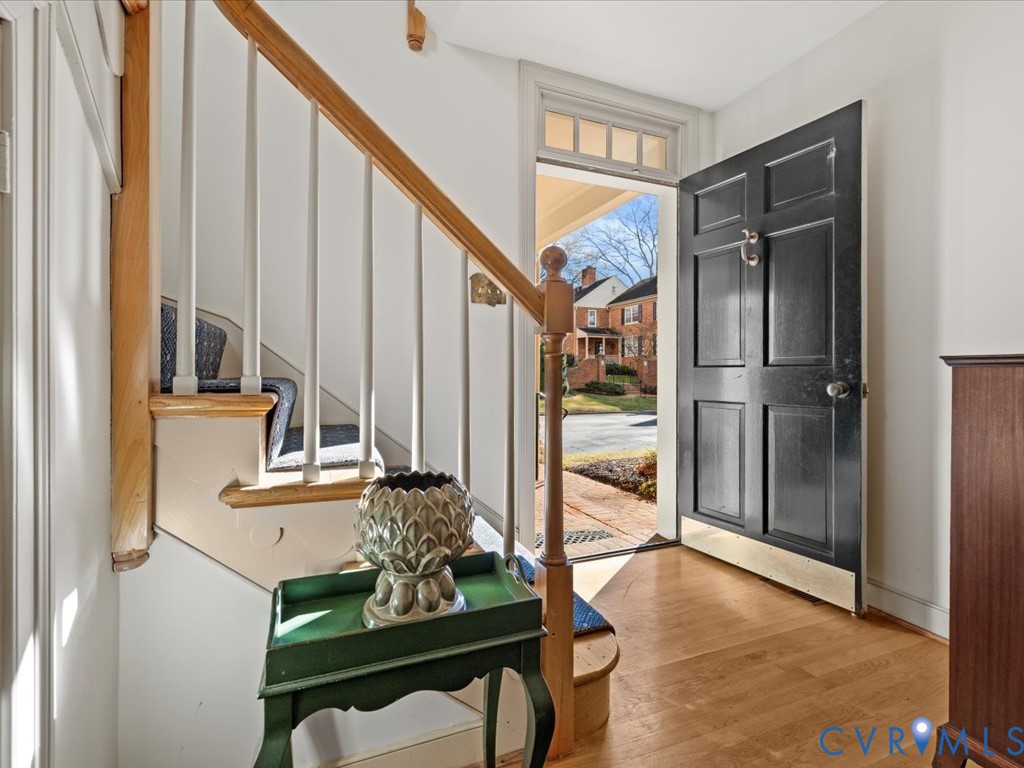 6161 River Road, Unit 36 Richmond, VA 23226 - Photo 5 of 37 Vestibule with storage, stairs to 2nd-level unit