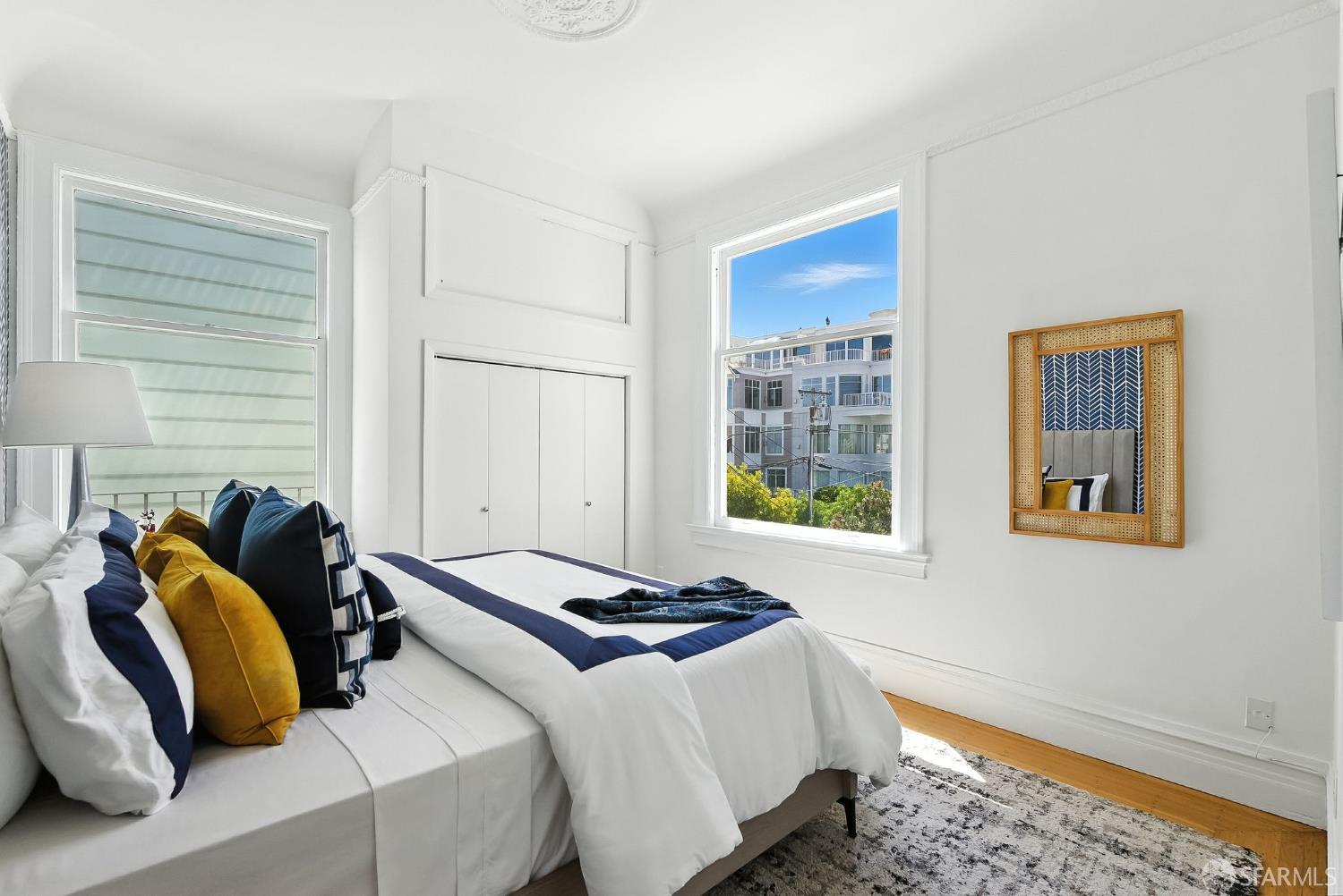140 Divisadero Street, Unit 5 San Francisco, CA 94117 - Photo 20 of 32 a bedroom with a bed and a window