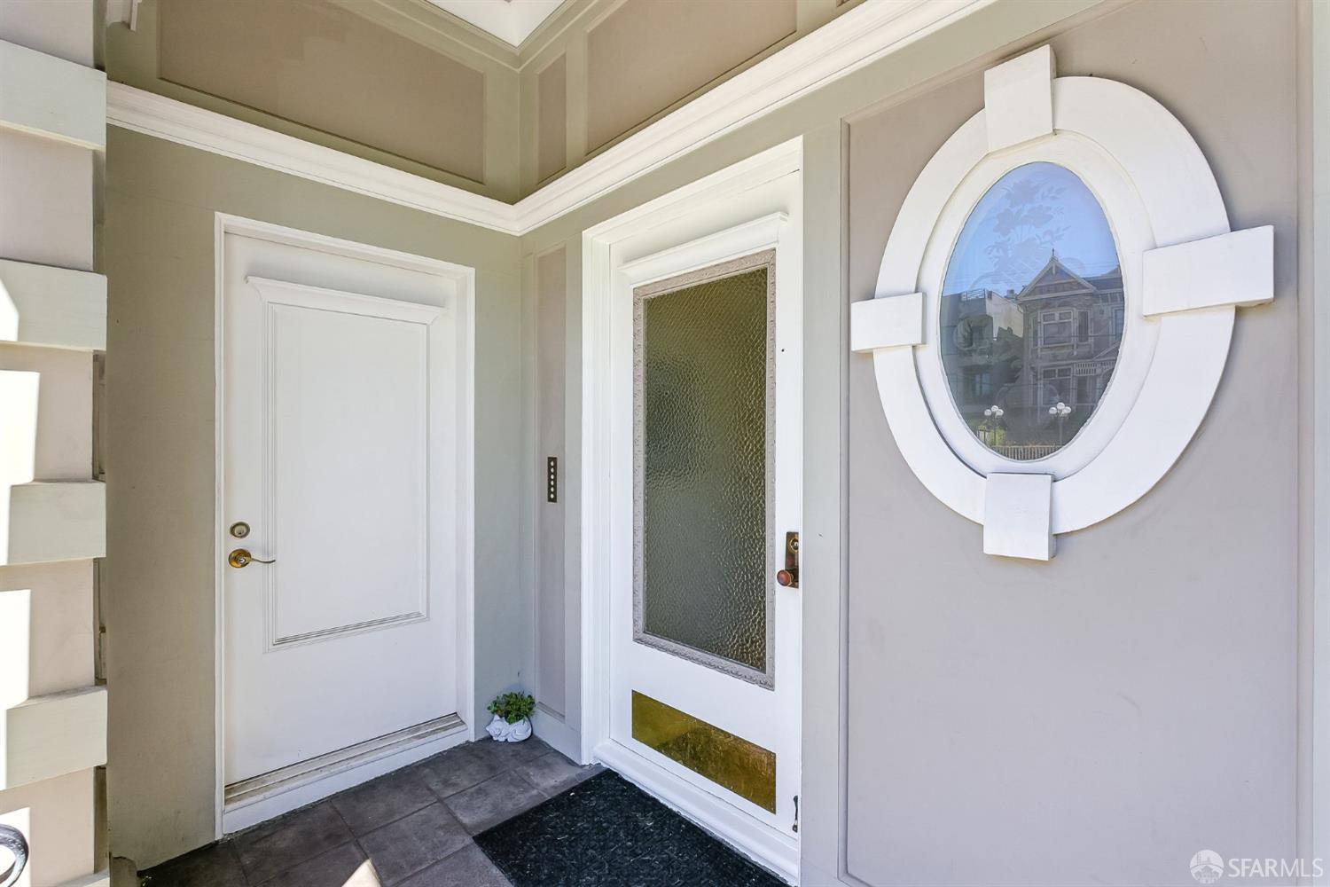 140 Divisadero Street, Unit 5 San Francisco, CA 94117 - Photo 23 of 32 a bathroom with a sink and a mirror