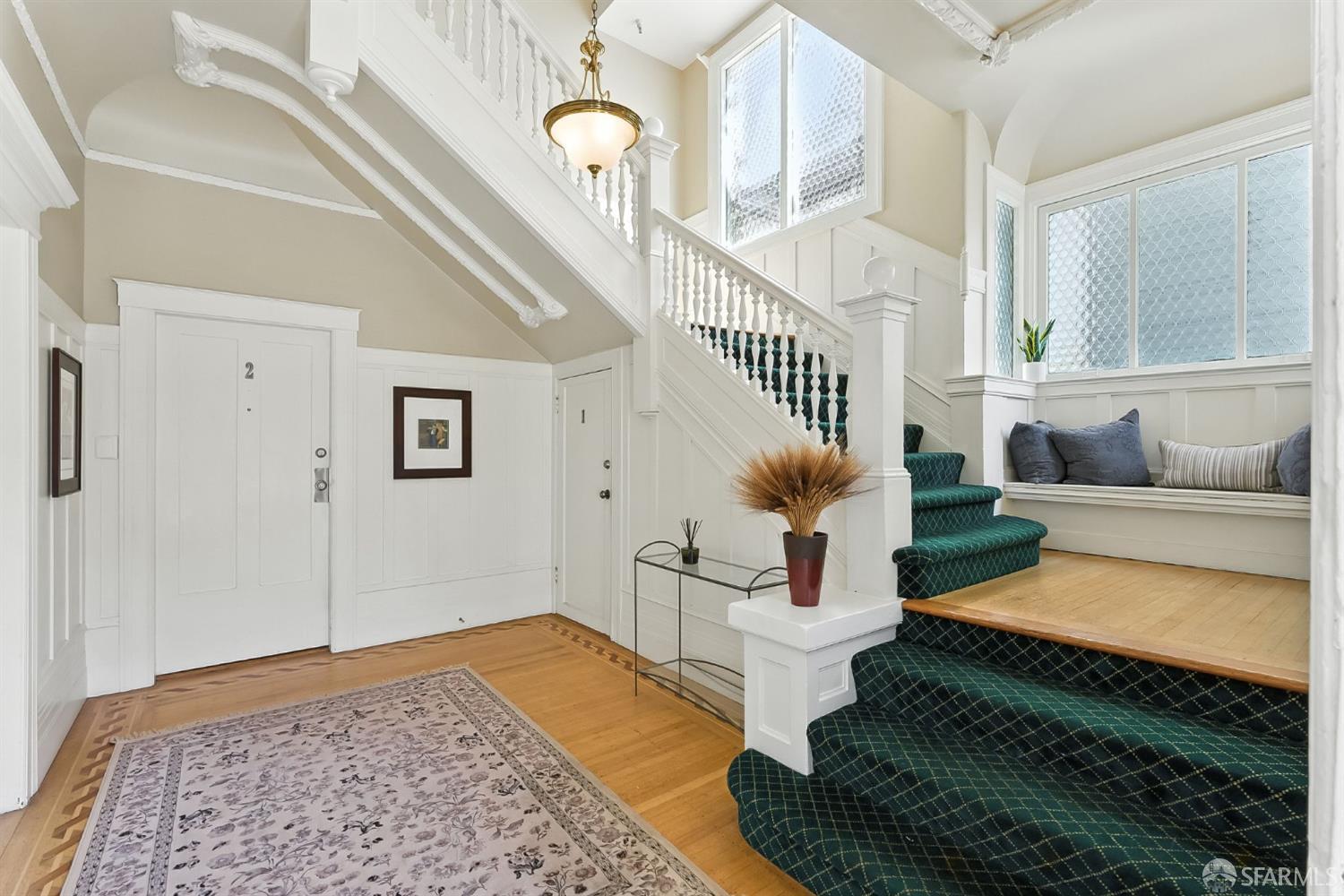 140 Divisadero Street, Unit 5 San Francisco, CA 94117 - Photo 24 of 32 a living room with furniture and a rug