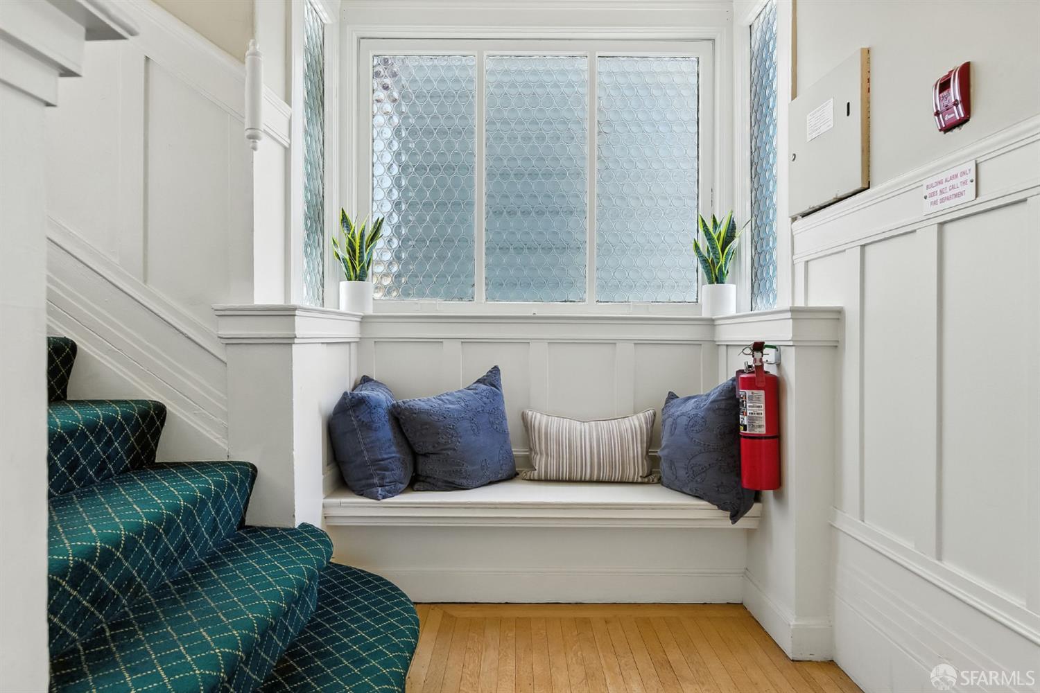 140 Divisadero Street, Unit 5 San Francisco, CA 94117 - Photo 26 of 32 a living room with furniture and a fireplace