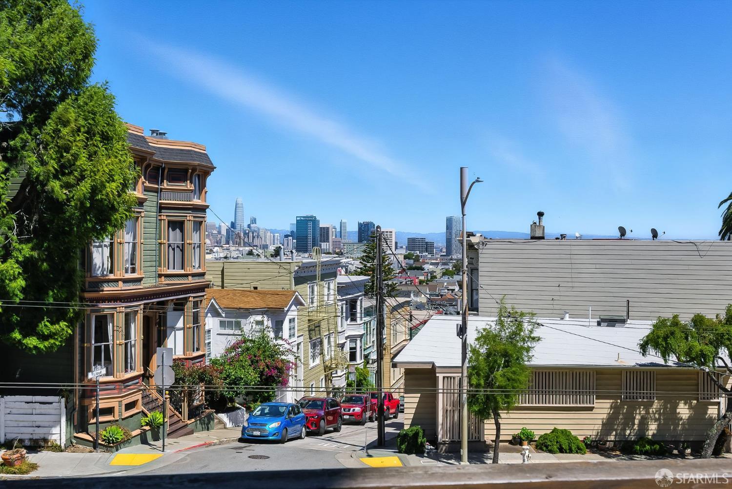 140 Divisadero Street, Unit 5 San Francisco, CA 94117 - Photo 29 of 32 a city street lined with buildings and trees