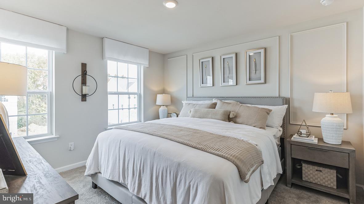 6 Baybreeze Drive Waretown, NJ 08758 - Photo 14 of 22 a bedroom with a bed a mirror and a window