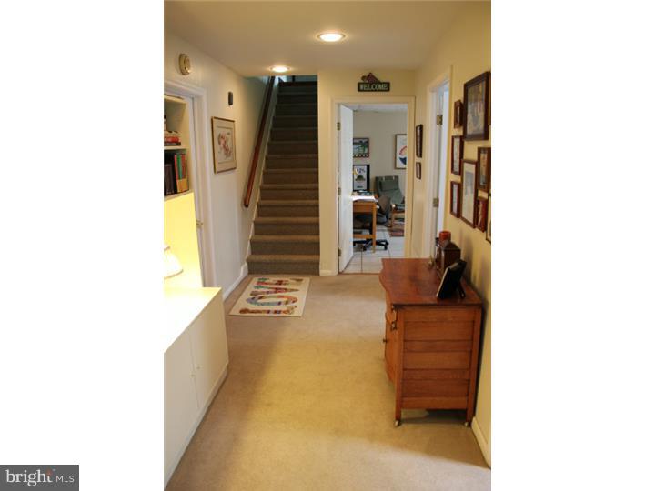 3410 Lewis Road Newtown Square, PA 19073 - Photo 13 of 23 a living room with furniture and a large window