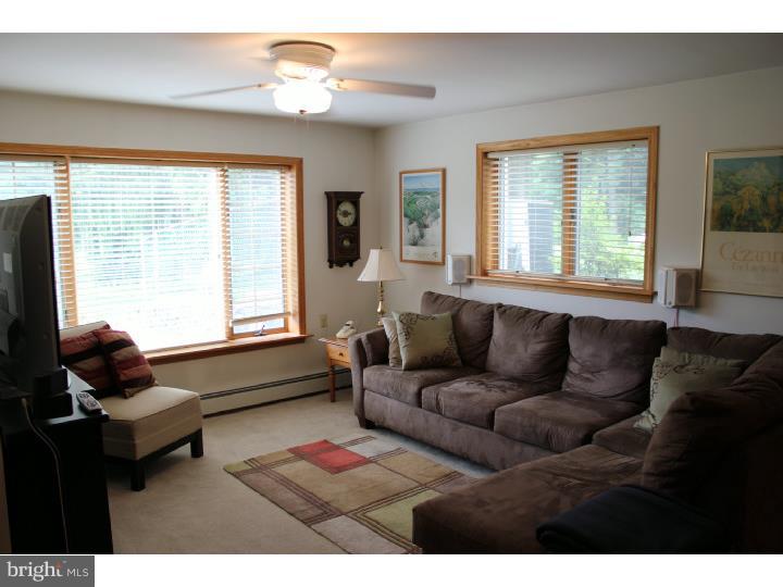3410 Lewis Road Newtown Square, PA 19073 - Photo 14 of 23 a living room with furniture and a window