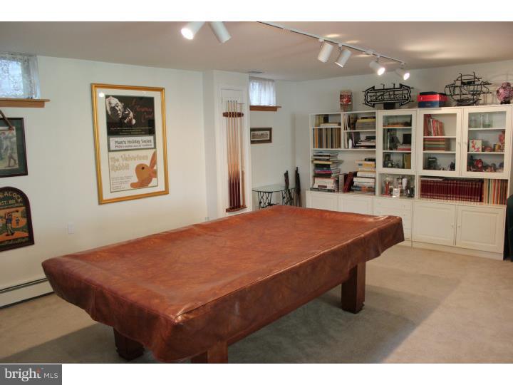 3410 Lewis Road Newtown Square, PA 19073 - Photo 15 of 23 a bedroom with a bed a dresser and bookshelf