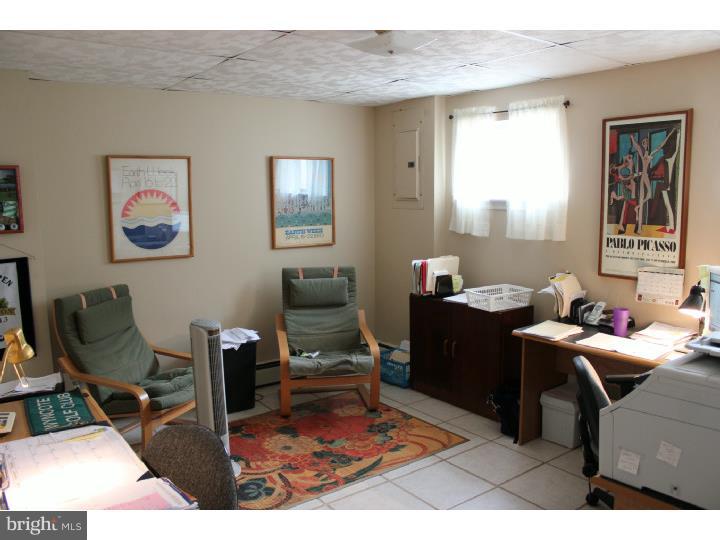 3410 Lewis Road Newtown Square, PA 19073 - Photo 16 of 23 a living room with furniture a rug and a window