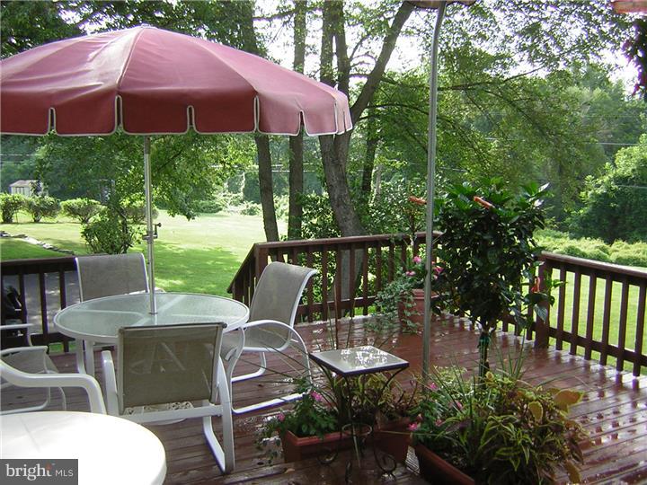 3410 Lewis Road Newtown Square, PA 19073 - Photo 19 of 23 a view of an outdoor sitting area with furniture
