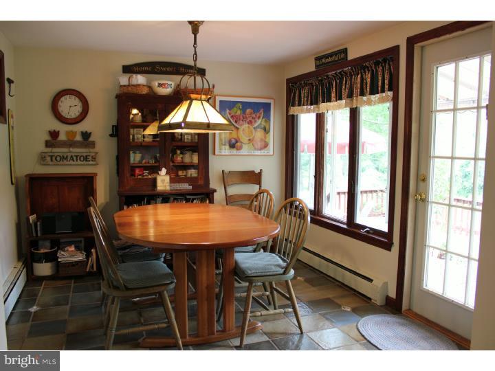 3410 Lewis Road Newtown Square, PA 19073 - Photo 3 of 23 a view of a dining room with furniture and window