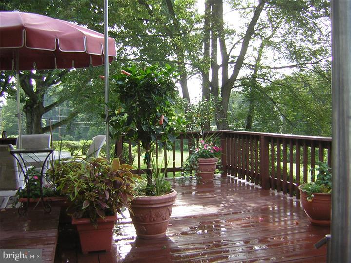 3410 Lewis Road Newtown Square, PA 19073 - Photo 23 of 23 a view of a table and chairs in patio