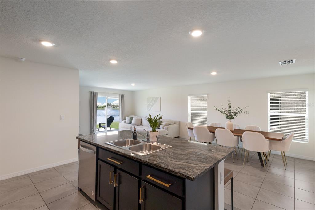 2938 Rock Sound Street Bradenton, FL 34208 - Photo 12 of 36 a room with furniture and window