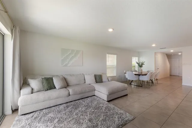 a living room with furniture and a couch