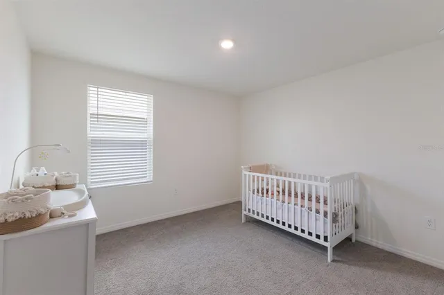 a view of a room with toys and a window