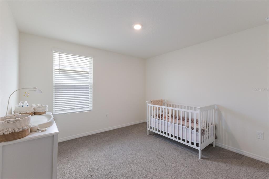 2938 Rock Sound Street Bradenton, FL 34208 - Photo 25 of 36 a view of a room with toys and a window