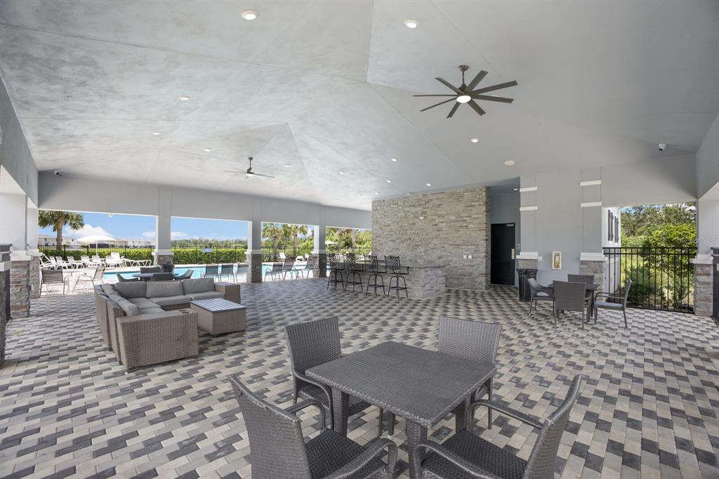 2938 Rock Sound Street Bradenton, FL 34208 - Photo 34 of 36 a living room with furniture and a large window