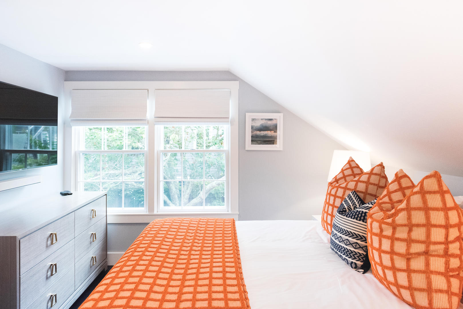 59 Orange Street Nantucket, MA 02554 - Photo 20 of 42 a bedroom with a bed and a window