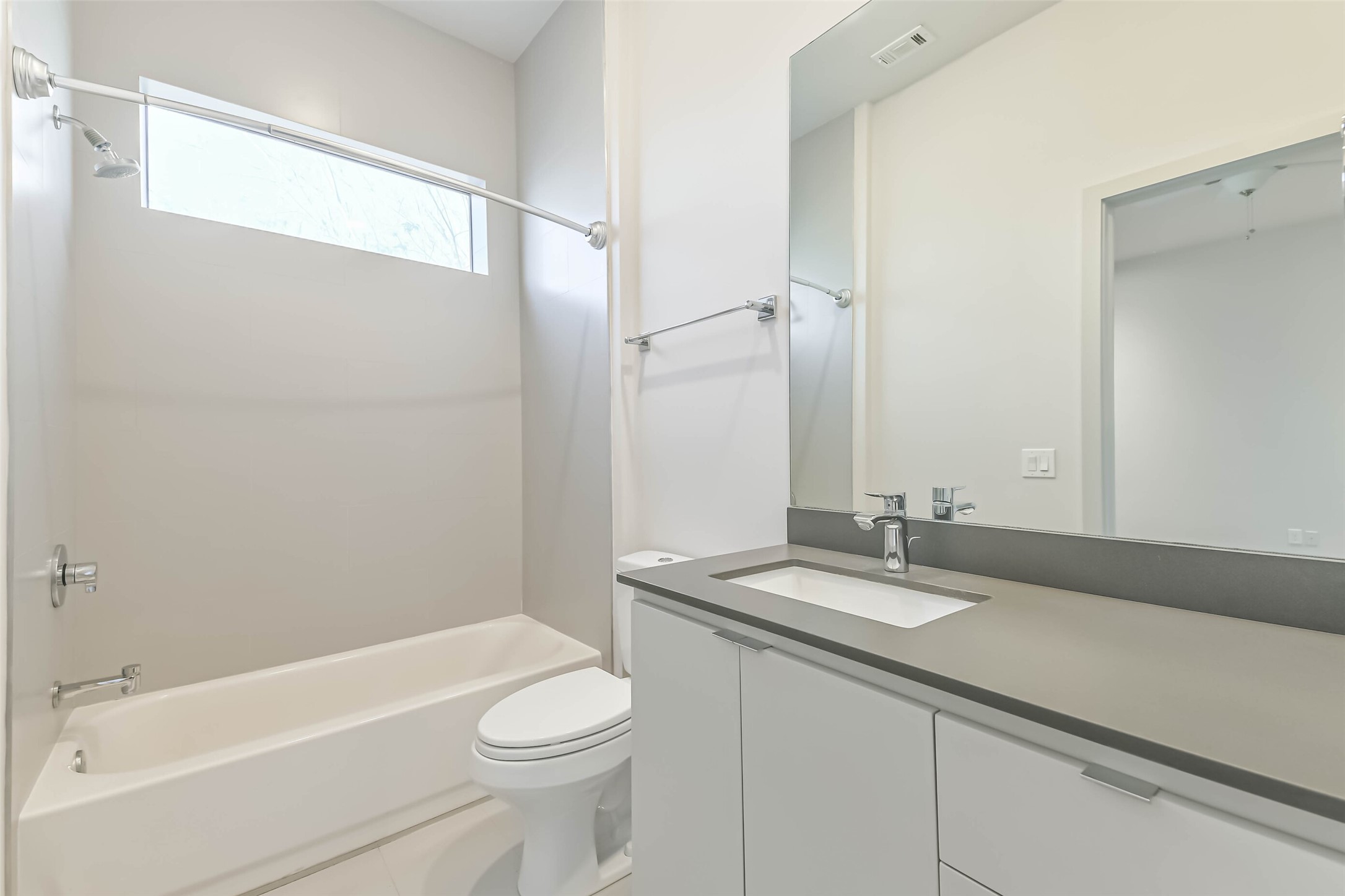 1509 Ruth Street Houston, TX 77004 - Photo 22 of 33 The secondary bathroom is enhanced by windows that allow natural light to permeate the space. Abundant storage with custom cabinets and walk-in closet add to the exceptional features of this home.