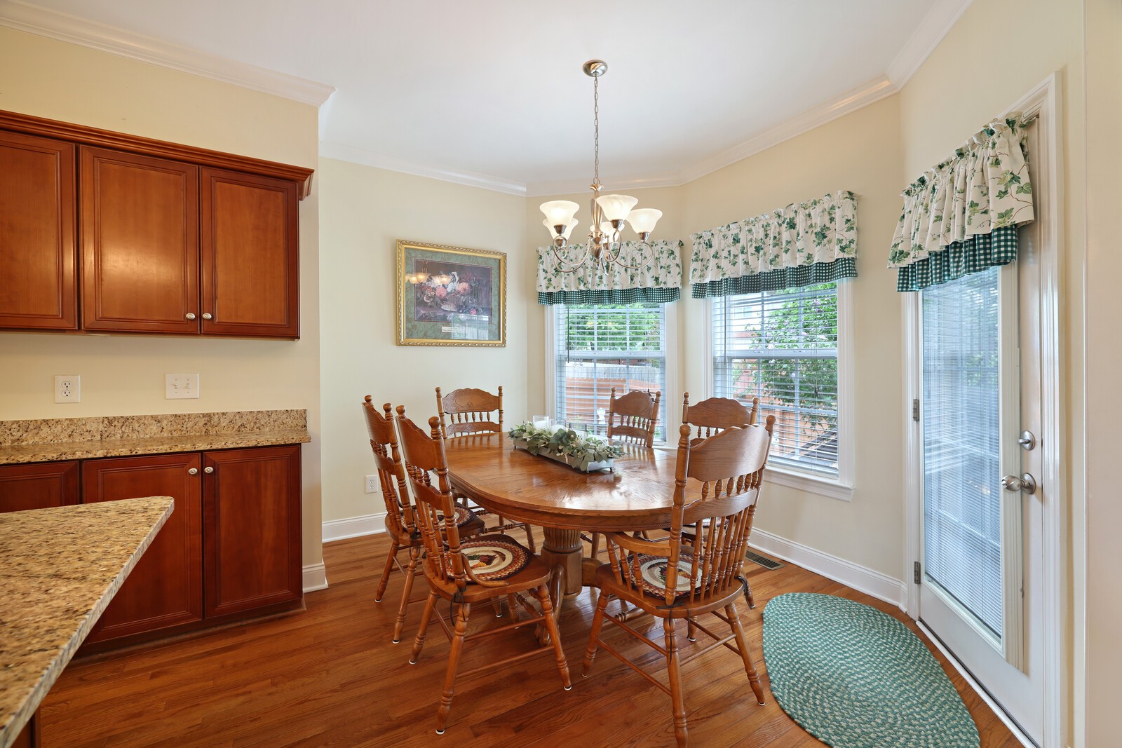 3020 Brookside Path Murfreesboro, TN 37128 - Photo 20 of 59 a view of a dining room with furniture wooden floor and chandelier