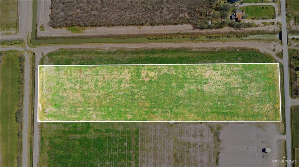 4181 Mile 12 1/2 N Road Weslaco, TX 78599 - Photo 12 of 14 a view of a fence from a yard
