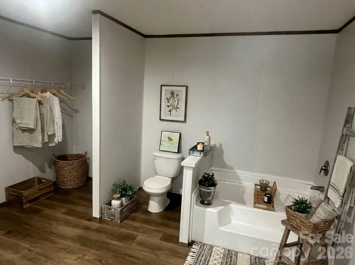 299 Ned Williams Road Kershaw, SC 29067 - Photo 13 of 43 a bathroom with a sink toilet and shower