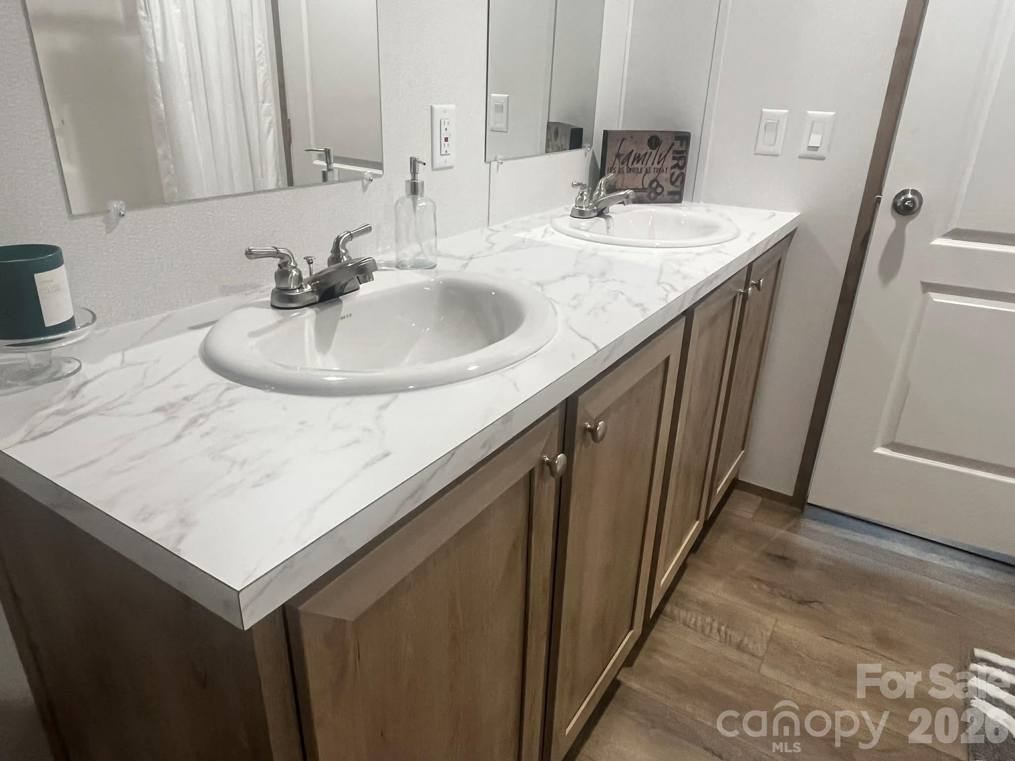 299 Ned Williams Road Kershaw, SC 29067 - Photo 14 of 43 a bathroom with a sink and a mirror