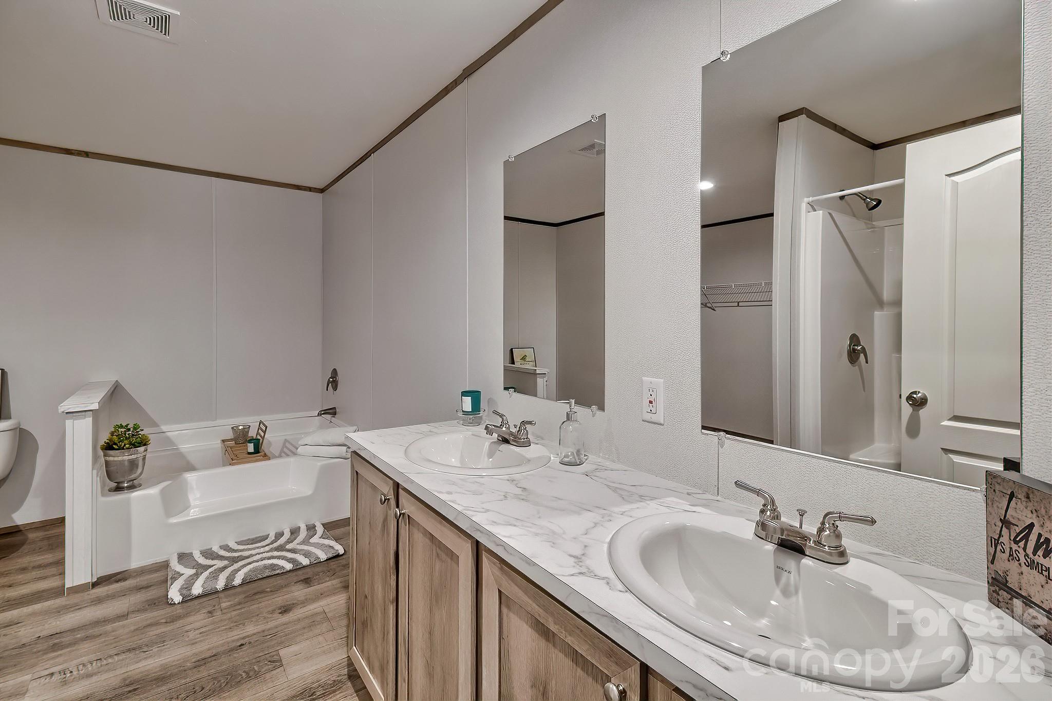 299 Ned Williams Road Kershaw, SC 29067 - Photo 24 of 43 a bathroom with a sink and a mirror